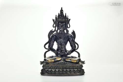 CHINESE PARTLY GILT BRONZE SEATED BUDDHA