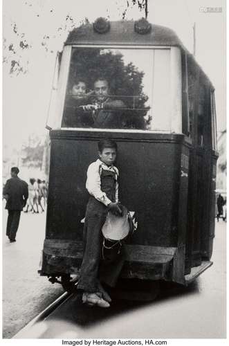 Elliott Erwitt (American, 1928) Boy on a Streetc