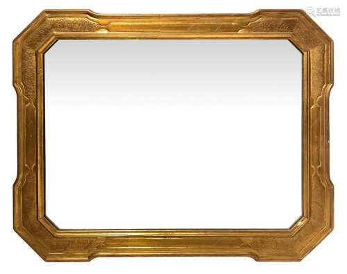 Golden mirror in golden rectangular wooden wood