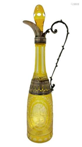 Bohemian bourished glass bottle in yellow tones with