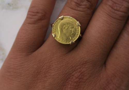 Bague en or jaune 750°/00 sertie d'une pièce de 5 francs 185...