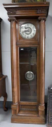 A grandfather clock, early 20th century.