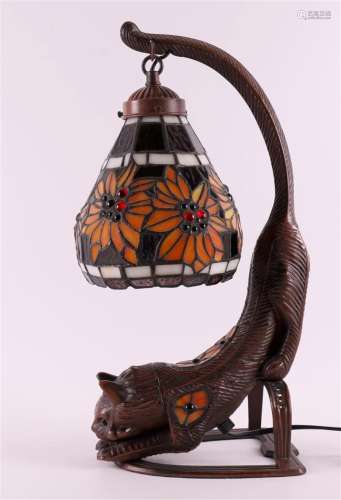 A brown patinated composite metal table lamp, 20th century.