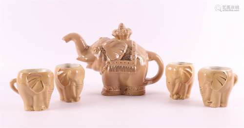 A china teapot in the shape of an elephant with cups, China ...
