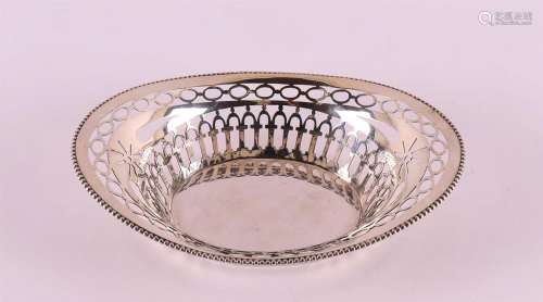 An oval silver ajour bonbon basket with pearl rim, year lett...