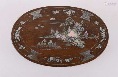 An oval tropical wooden box with lid, China around 1900.