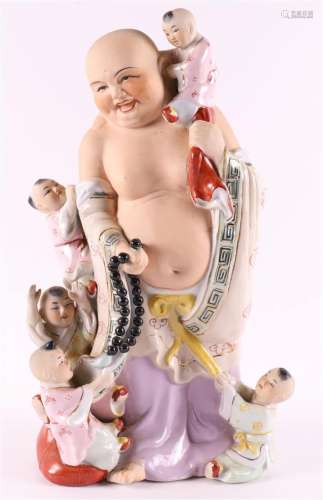 A polychrome porcelain happy Buddha, China, 20th century.