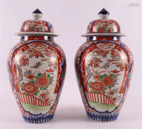 A pair of porcelain Imari vases with lids, Japan, Meiji, aro...