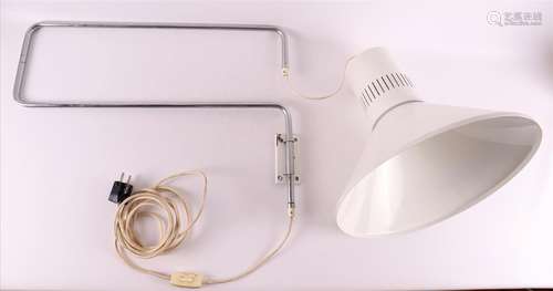 A white metal design wall lamp on a chrome metal arm, 1970s.