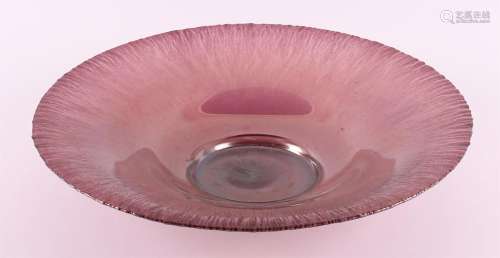 Netherlands, Maastricht. A round purple glass bowl with tin ...