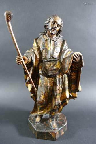 Saint tenant une baton en bois sculpté peint et doré, ép. XV...