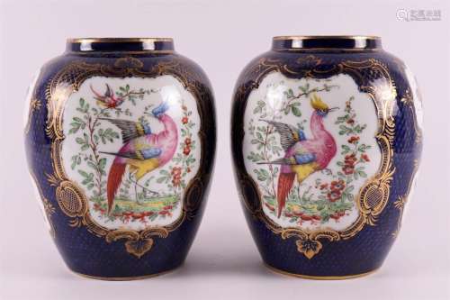 A pair of blue glazed porcelain vases, circa 1900.