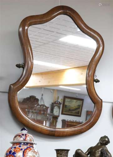 A Biedermeier mirror in mahogany frame, 19th century.