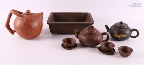 A lot of various yixing stoneware including teapot and bowls...