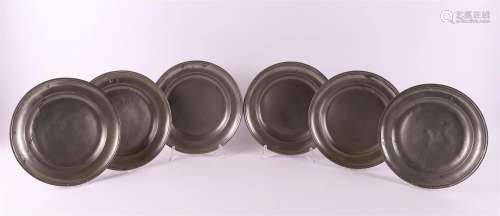 A series of six blank pewter plates after an antique example...