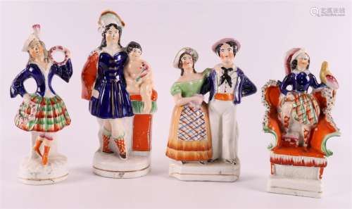 Four polychrome Staffordshire pottery figurines, England 19t...