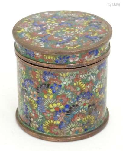 An Oriental pot and cover of cylindrical form with floral cl...