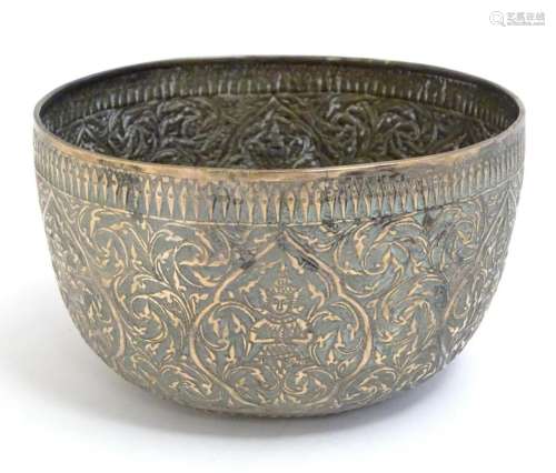 An Indian silver plate bowl with embossed scrolling foliate ...