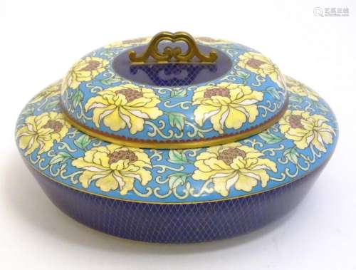A cloisonne pot and cover of circular form with floral and f...