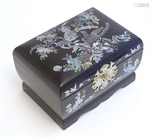 A 20thC Oriental jewellery box with inlaid abalone detail de...