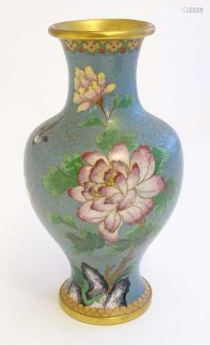An Oriental cloisonne baluster vase decorated with flowers, ...