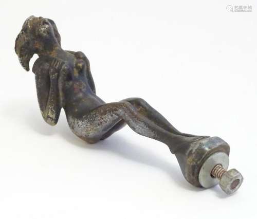 A 20thC cast bronze car mascot formed as a nude woman with b...