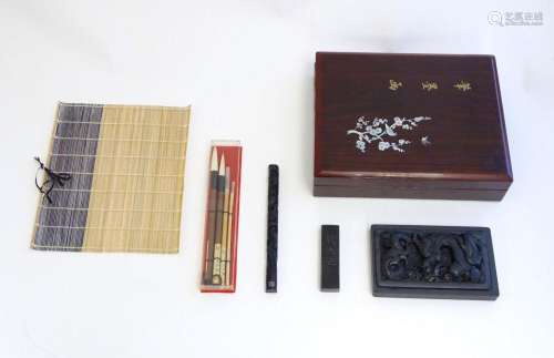 A late 20thC boxed Japanese calligraphy set, to include ink ...