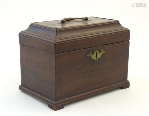 An 18thC mahogany tea caddy with handle to lid. Approx. 6 1/...