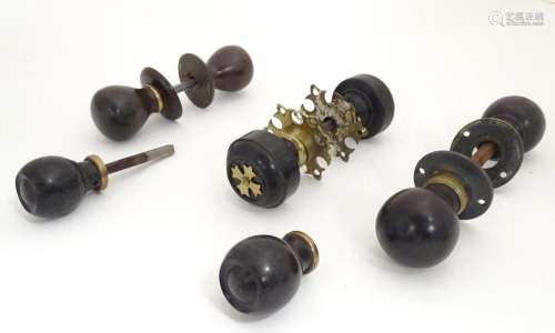 Four pairs of Victorian ebonised door knobs / handles / door...