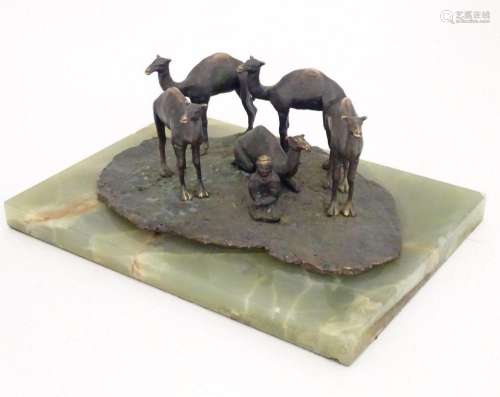 A late 19th / early 20thC bronze sculpture depicting camels ...