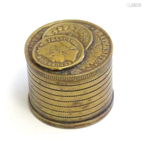 A 20thC Continental cast inkwell modelled as stacked coins, ...