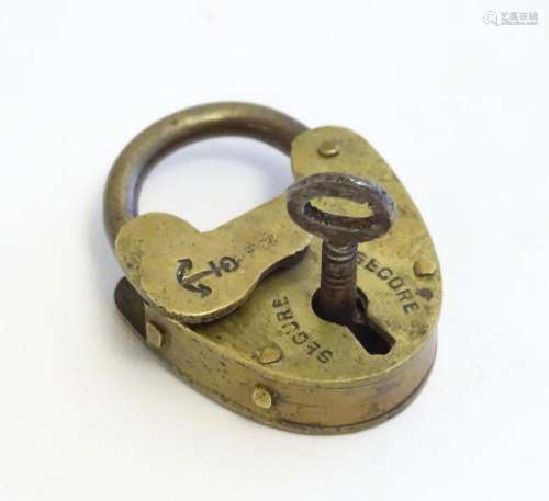 A 20thC cast padlock with anchor detail to keyhole cover. To...