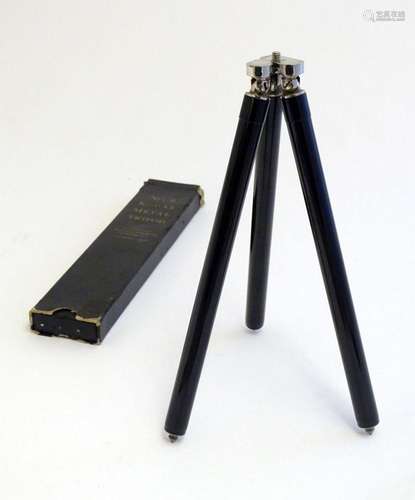 An Eastman Kodak no. 6 'Kodak Metal Tripod', in a ...