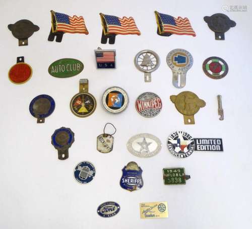 A collection of car / automobile badges, numerous American e...