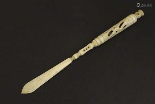 A Victorian bone letter opener / pen / stanhope with carved ...