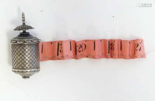 A Victorian white metal sewing tape measure. Approx. 1 1/2&q...