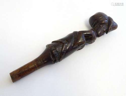 A Victorian carved walking cane handle modelled as a woman w...