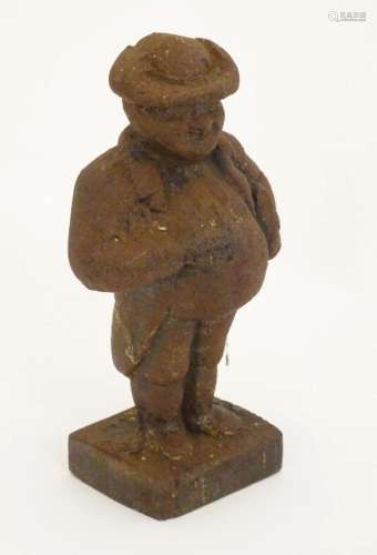 A 19thC cast iron model of a portly gentleman carrying a boo...
