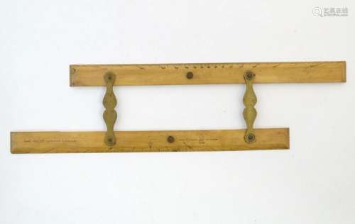 A boxwood and brass mounted parallel chart rule marked Capt....