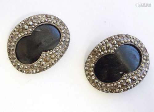 A pair of 19thC buckles of oval form with cut steel decorati...