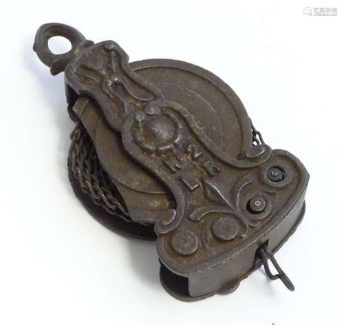 A French 19thC cast pulley with sprung chain mechanism. Appr...