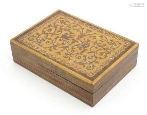 A 20thC parquetry box with scrolling foliate and stylised bi...