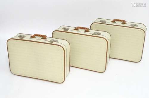 A mid 20thC set of three travelling suitcases by Cheney, Lon...