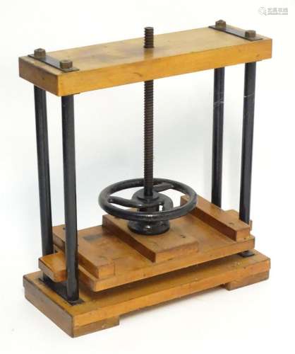 An early 20thC table top book press. Approx. 25" x 22&q...