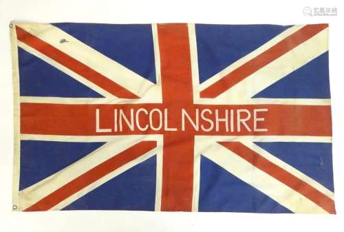 A mid 20thC Union flag, with applied stencil 'Lincolnsh...