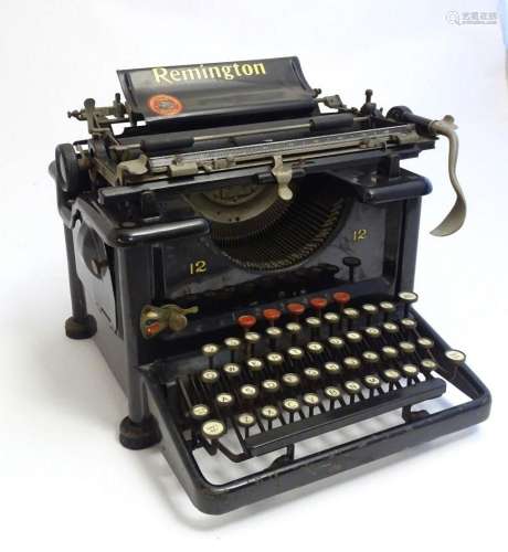 A 20thC Remington typewriter, no. 12. Approx. 11" high
