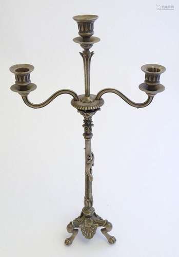 A Victorian silver plate three branch candelabra, with engra...