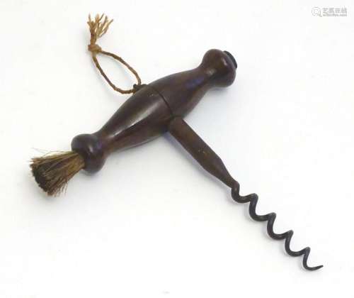A 19thC corkscrew with turned wooden handle set with brush. ...