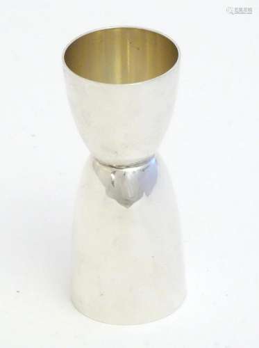 A silver double ended spirit measure, hallmarked Birmingham ...