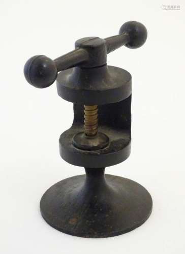A mid 20thC cast iron vice nutcracker, in the style of the R...